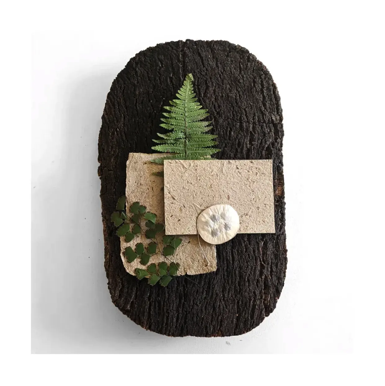 Scarta paper prototype presented with natural materials